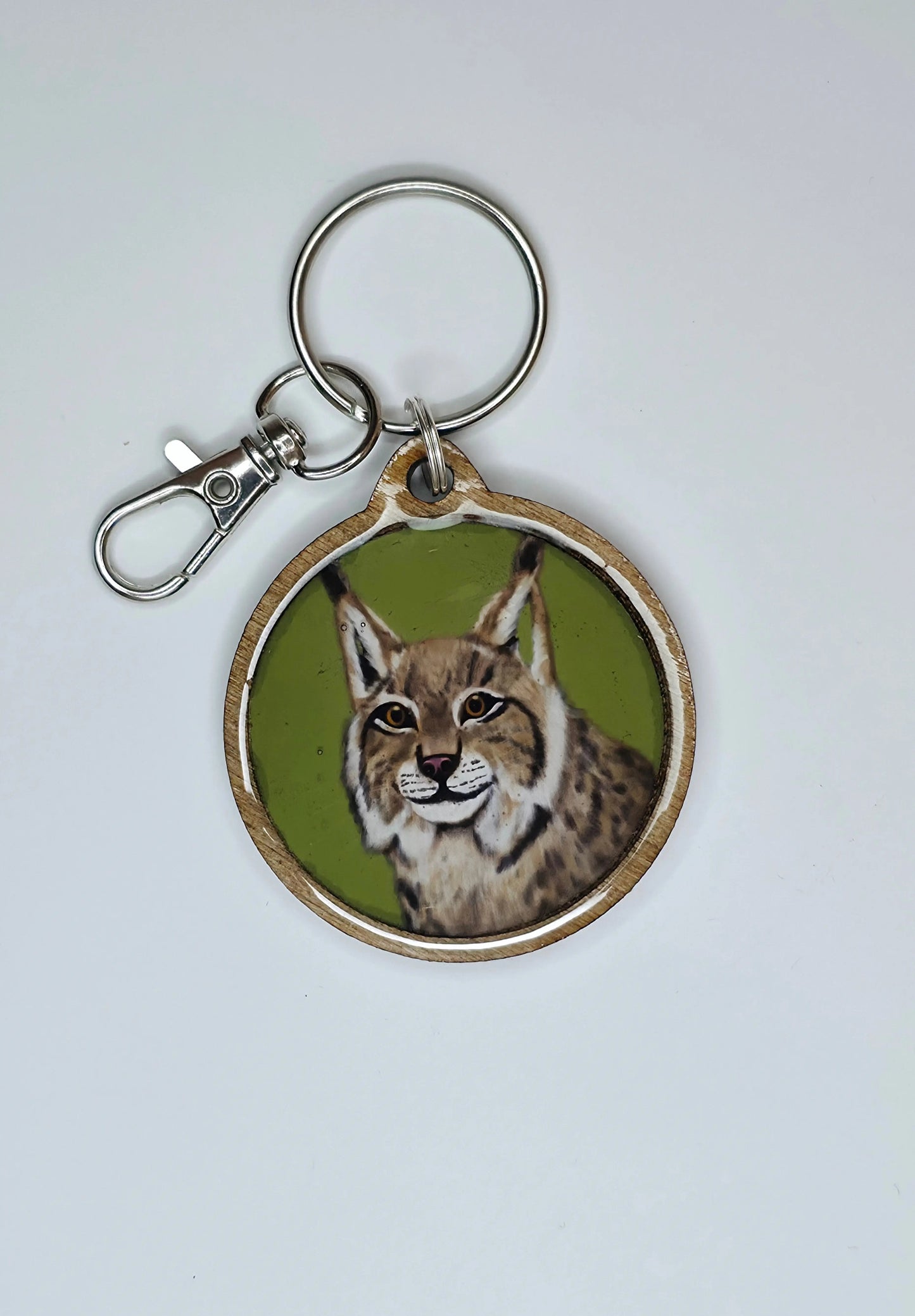 Vihreä Ilves-avaimenperä koivua ja epoksia