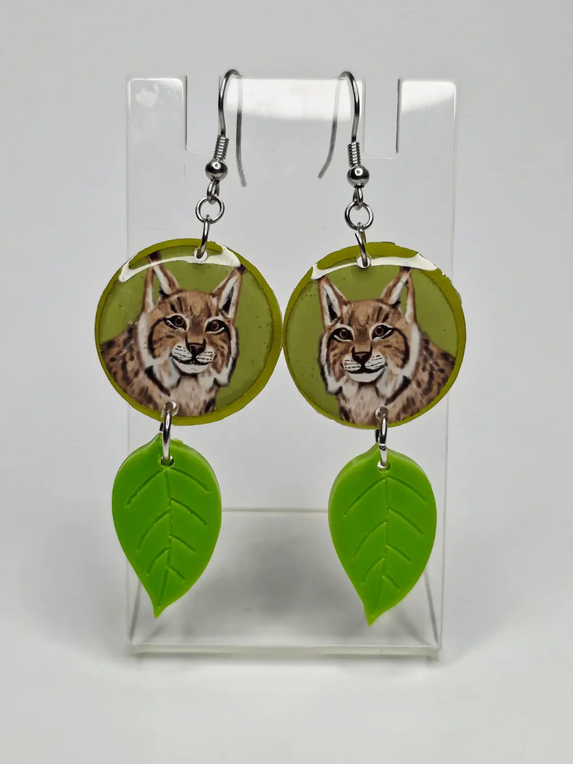 Vihreät Ilves-epoksikorvakorut