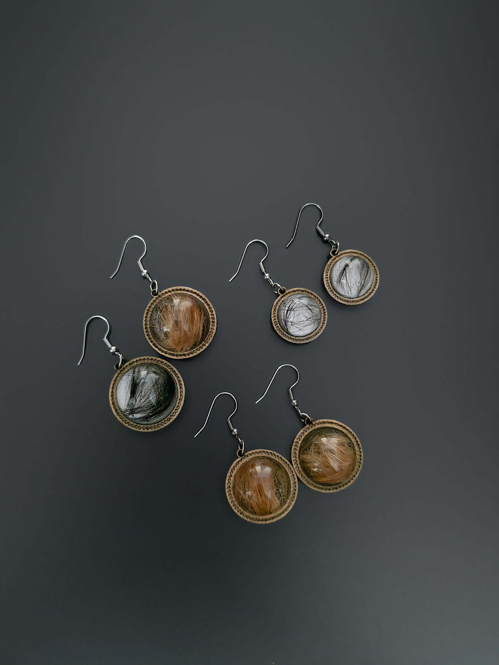 Wooden dangle earrings with ruffled resin spheres
